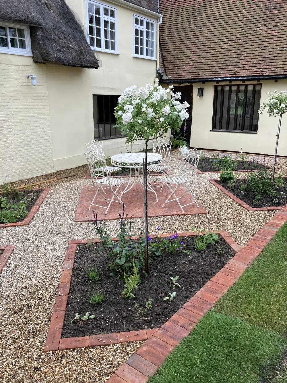 Tudor Barn Project - garden project by RAM Landscapes